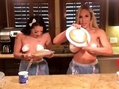 Naughty housewives cover their tits with whipped cream