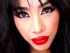 Exotic milf femdom red lipstick and cleavage tease on webcam