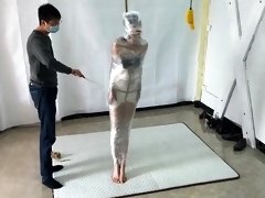 Sexy slim Japanese babe getting trained in extreme bondage