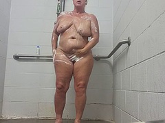 Sex in the shower with cum in the mouth, after a standing doggy style session, boobs bounce, ass and thighs move