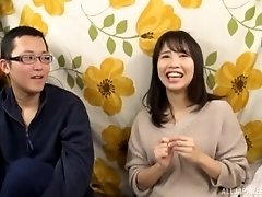 Brunette Japanese girl likes it when a friend rubs her cunt