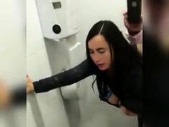 Hot teen fucked doggystyle by her stepdad in a public toilet