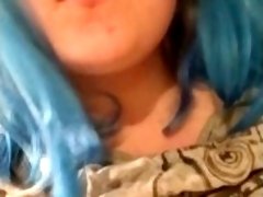 Girl with colored hair plays with her big fat tits