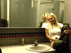 Two sexy blonde babes worship a POV cock in a public place